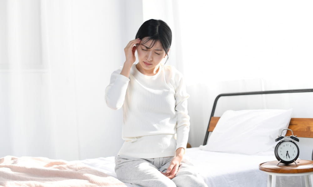 不調の女性
