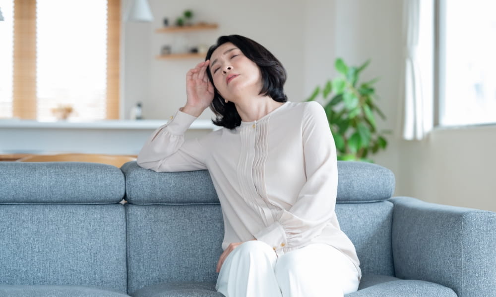 更年期障害でめまいの女性